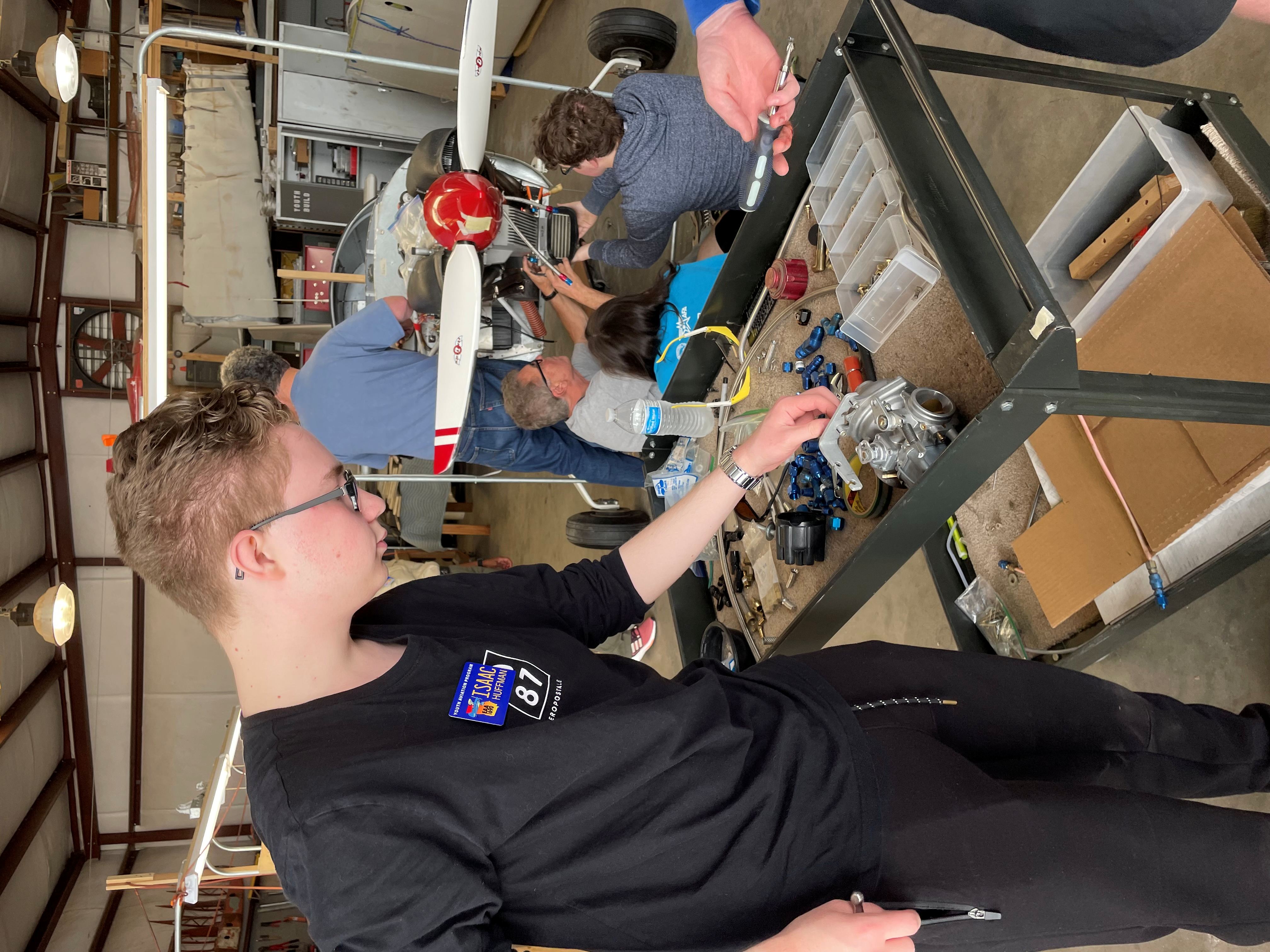 Working on a plane at EAA